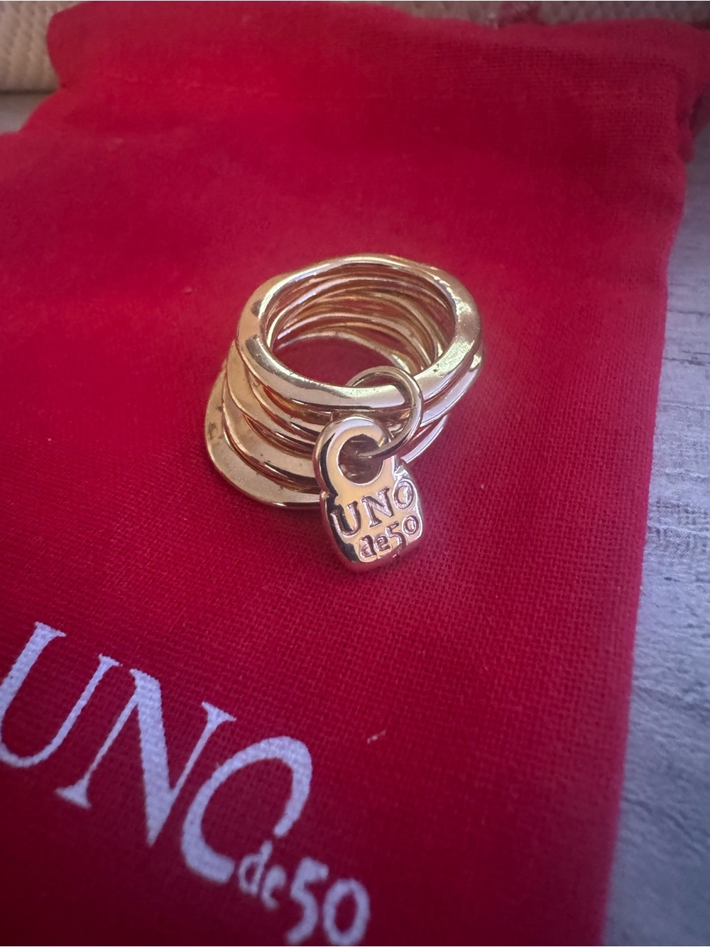 UNO de 50 Gold Stacked Band Ring with Signature Charm